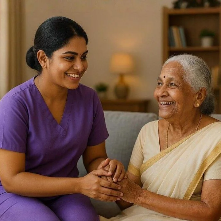A Pulso caregiver with an elderly woman at home in Kochi